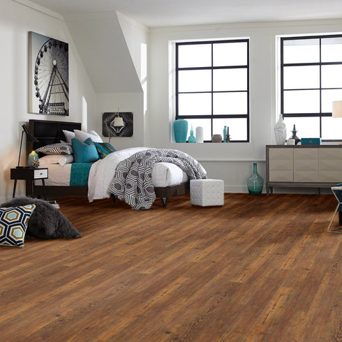 COREtec Originals Classics - Carolina Pine LVP flooring,  installed in  a bedroom.